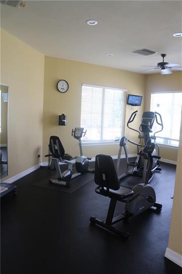 1900 Scofield Ridge Parkway, Unit 4701 Austin, TX 78727 - Photo 23 of 27 Fitness room offering exercise machines, recessed lighting, and ample natural illumination.