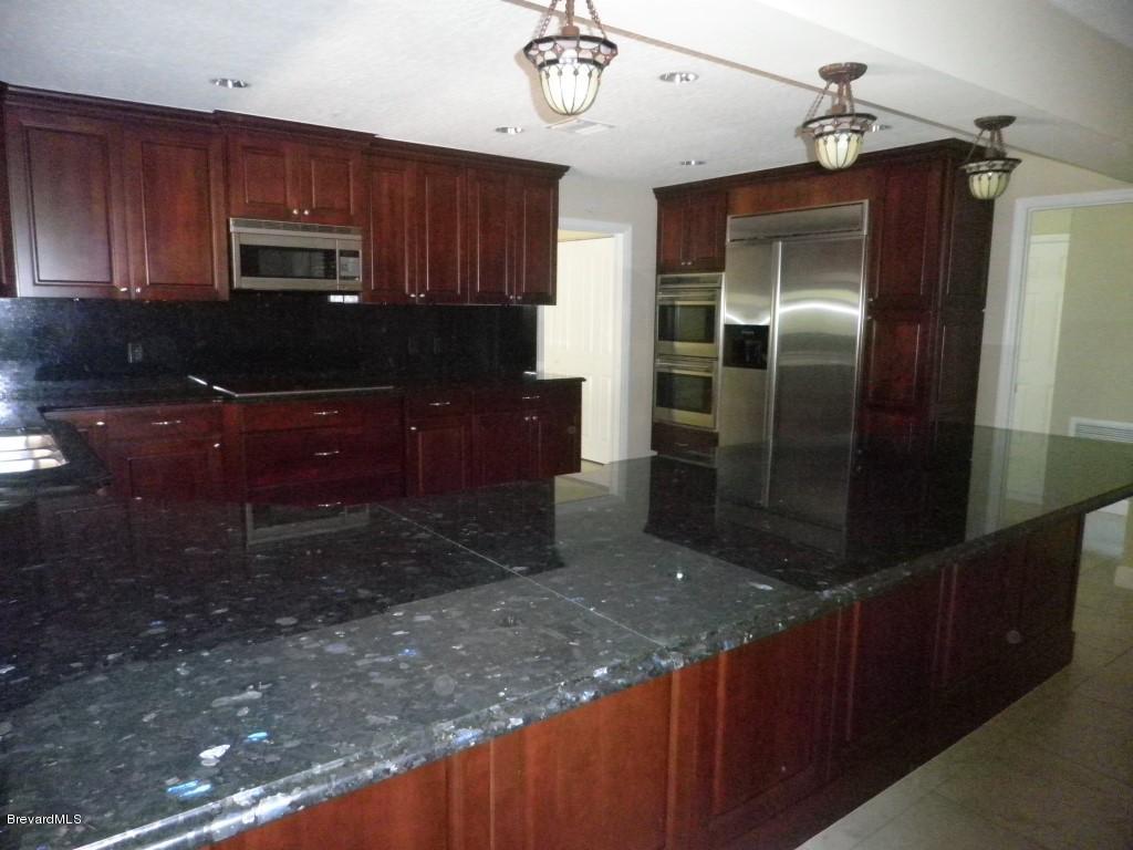 3080 Rio Palma South Melbourne, FL 32903 - Photo 3 of 22 Upscale Kitchen with Breakfast Bar