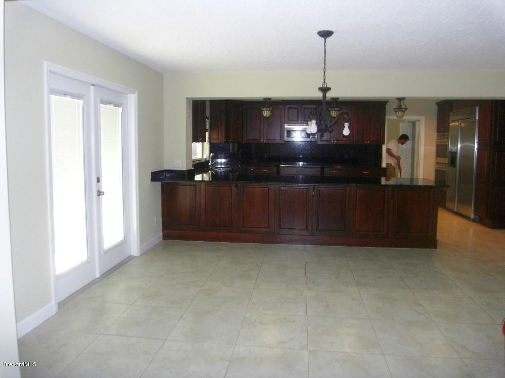 3080 Rio Palma South Melbourne, FL 32903 - Photo 7 of 22 Dining Opens to Kitchen and Living Room