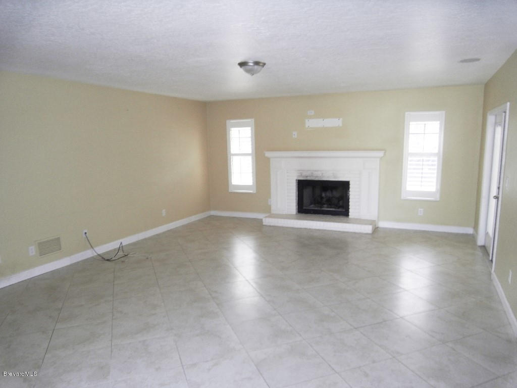 3080 Rio Palma South Melbourne, FL 32903 - Photo 8 of 22 Living Room with Fireplace