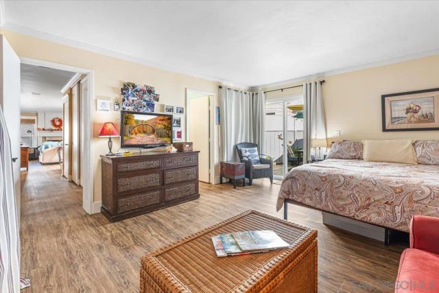 a bedroom with a bed and furniture