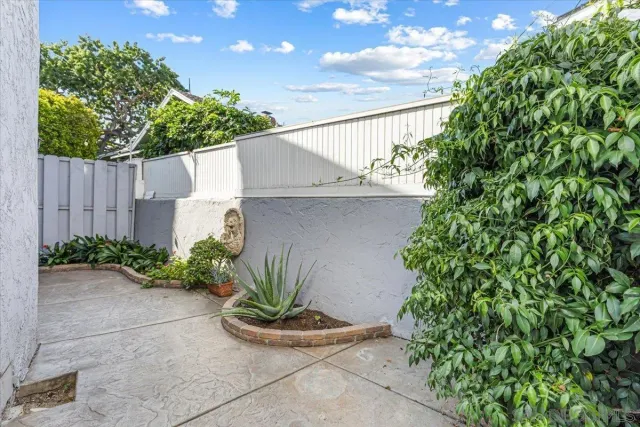 an aerial view of residential house with outdoor space and swimming pool