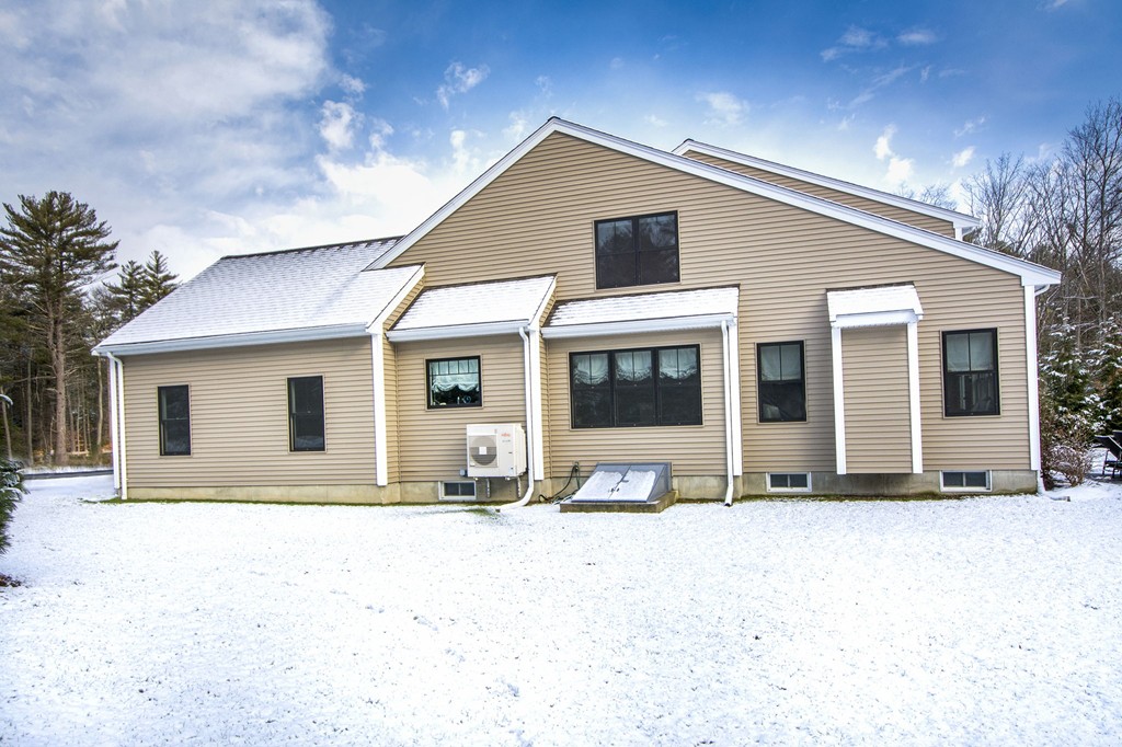 4 Kevin's Way, Unit 4 Scituate, MA 02066 - Photo 3 of 26 a front view of a house with a patio