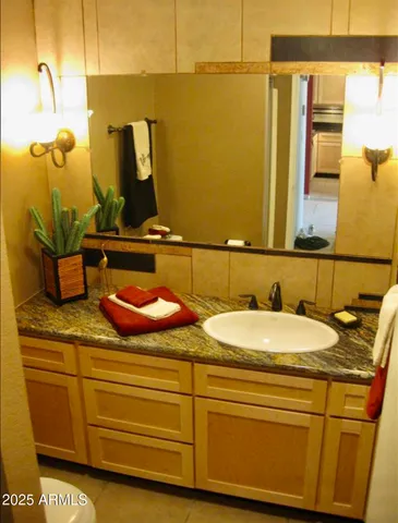 a view of a water fountain and a floor to ceiling window