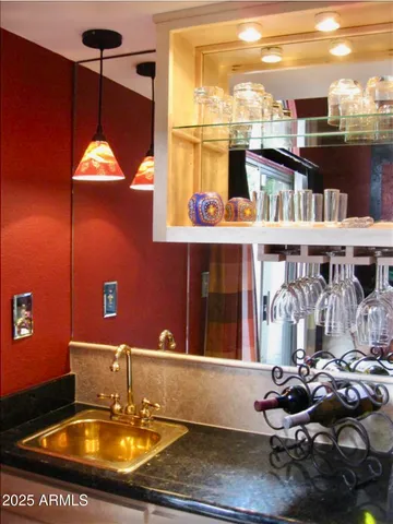 a room with furniture closet and a large window