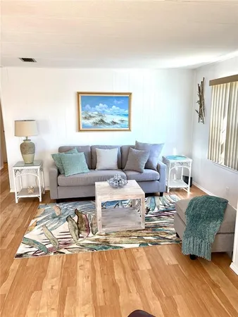 a bedroom with a bed and dresser