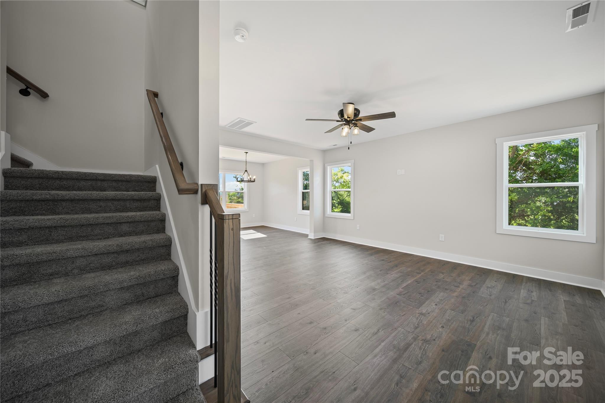 1308 Austin Chaney Road Wingate, NC 28174 - Photo 13 of 48 a view of an entryway with wooden floor and staircase