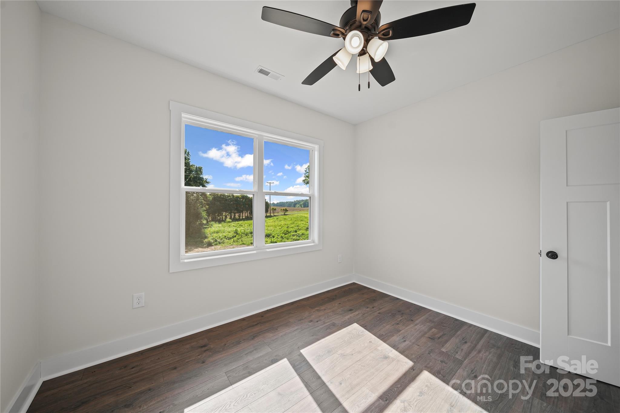 1308 Austin Chaney Road Wingate, NC 28174 - Photo 27 of 48 a view of an empty room with a window