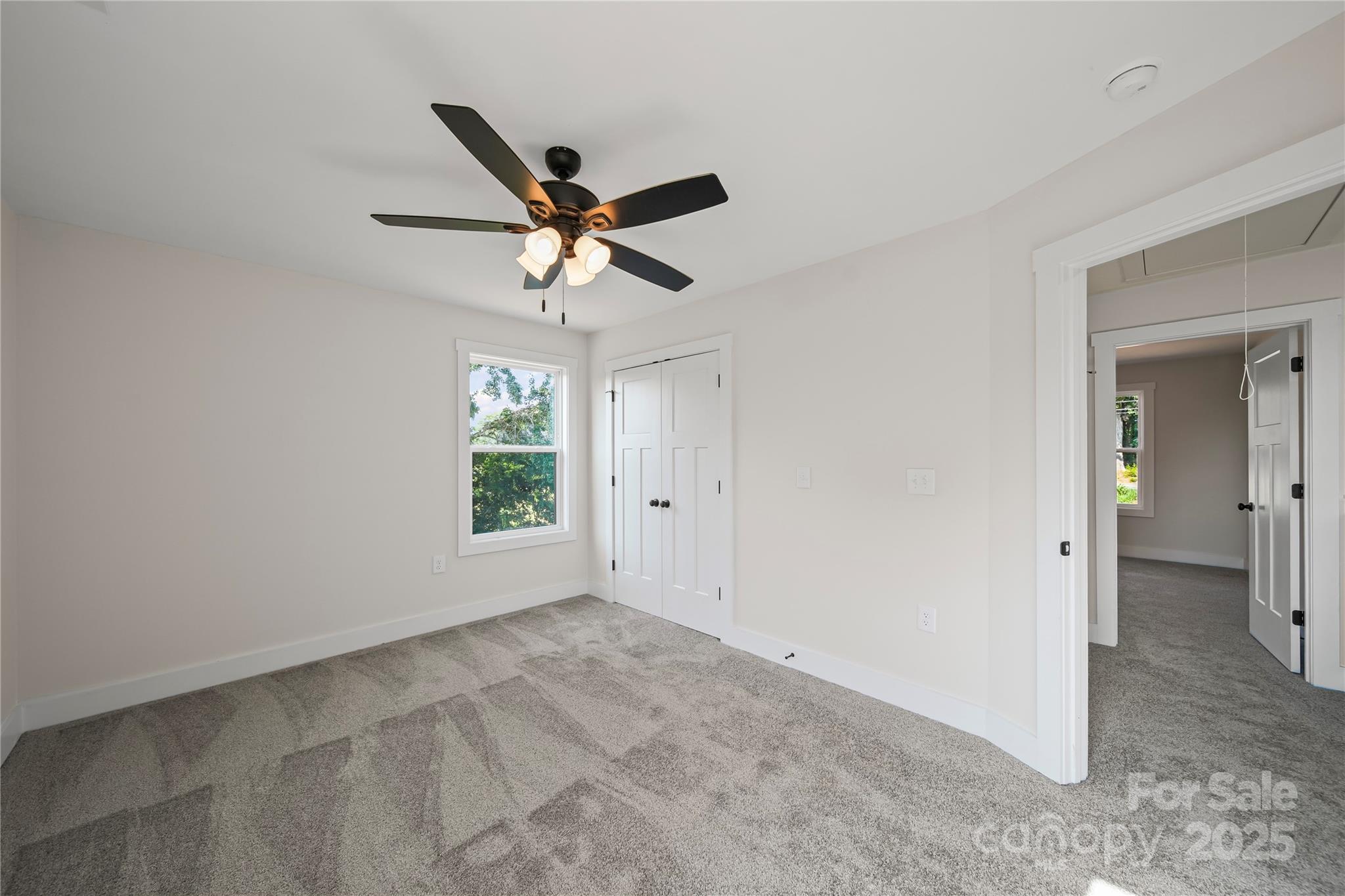 1308 Austin Chaney Road Wingate, NC 28174 - Photo 47 of 48 a view of room with a ceiling fan and a window