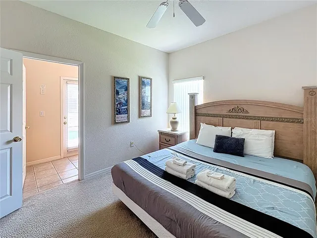 a bedroom with a bed and a cabinets