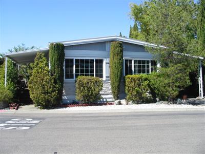 210 Olympic Way, Unit 210 San Rafael, CA 94903 - Photo 1 of 10 front view of a house with a yard