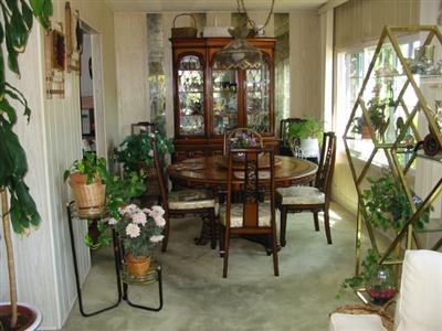 210 Olympic Way, Unit 210 San Rafael, CA 94903 - Photo 2 of 10 a view of a porch with chairs and potted plants