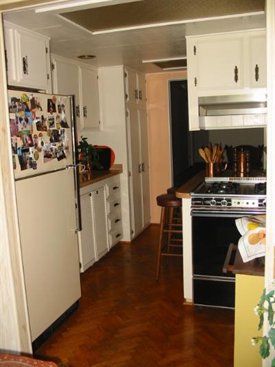 210 Olympic Way, Unit 210 San Rafael, CA 94903 - Photo 7 of 10 a kitchen with stainless steel appliances a stove and a refrigerator