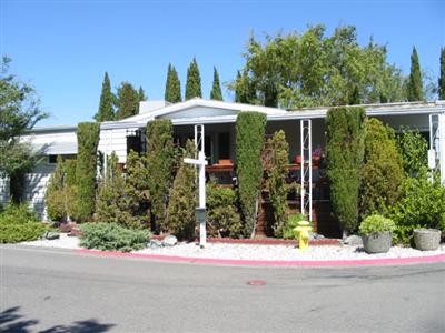 210 Olympic Way, Unit 210 San Rafael, CA 94903 - Photo 10 of 10 a backyard of a house with a yard and outdoor seating