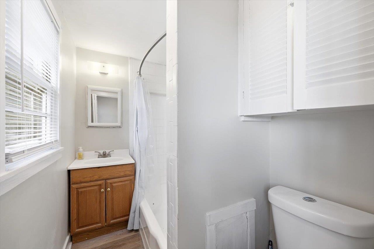 5096 Battlefield Road Harrisonburg, VA 22801 - Photo 18 of 38 a bathroom with a sink toilet and vanity