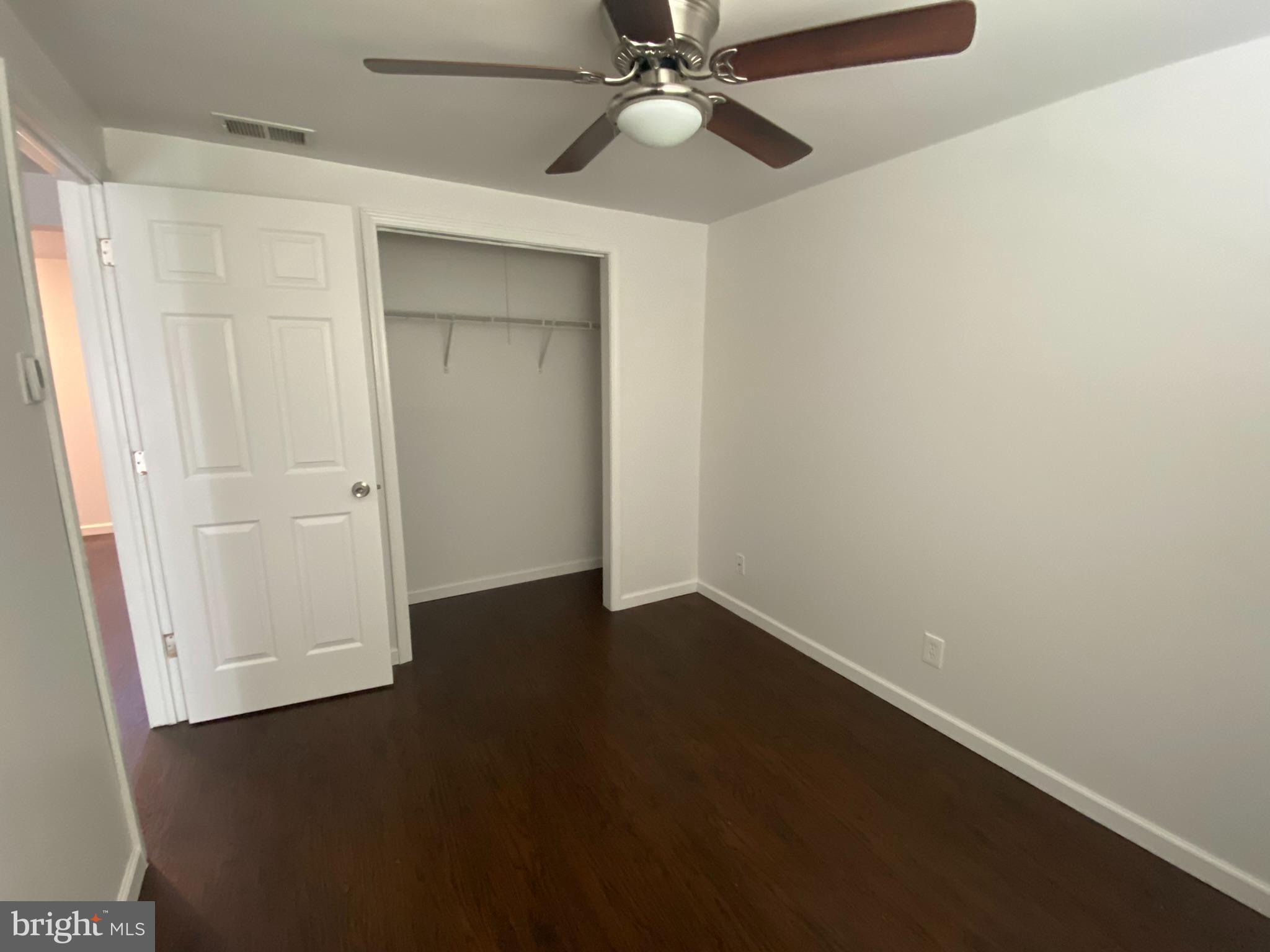 22 Fairmount Drive Glassboro, NJ 08028 - Photo 28 of 41 an empty room with a fan and a window