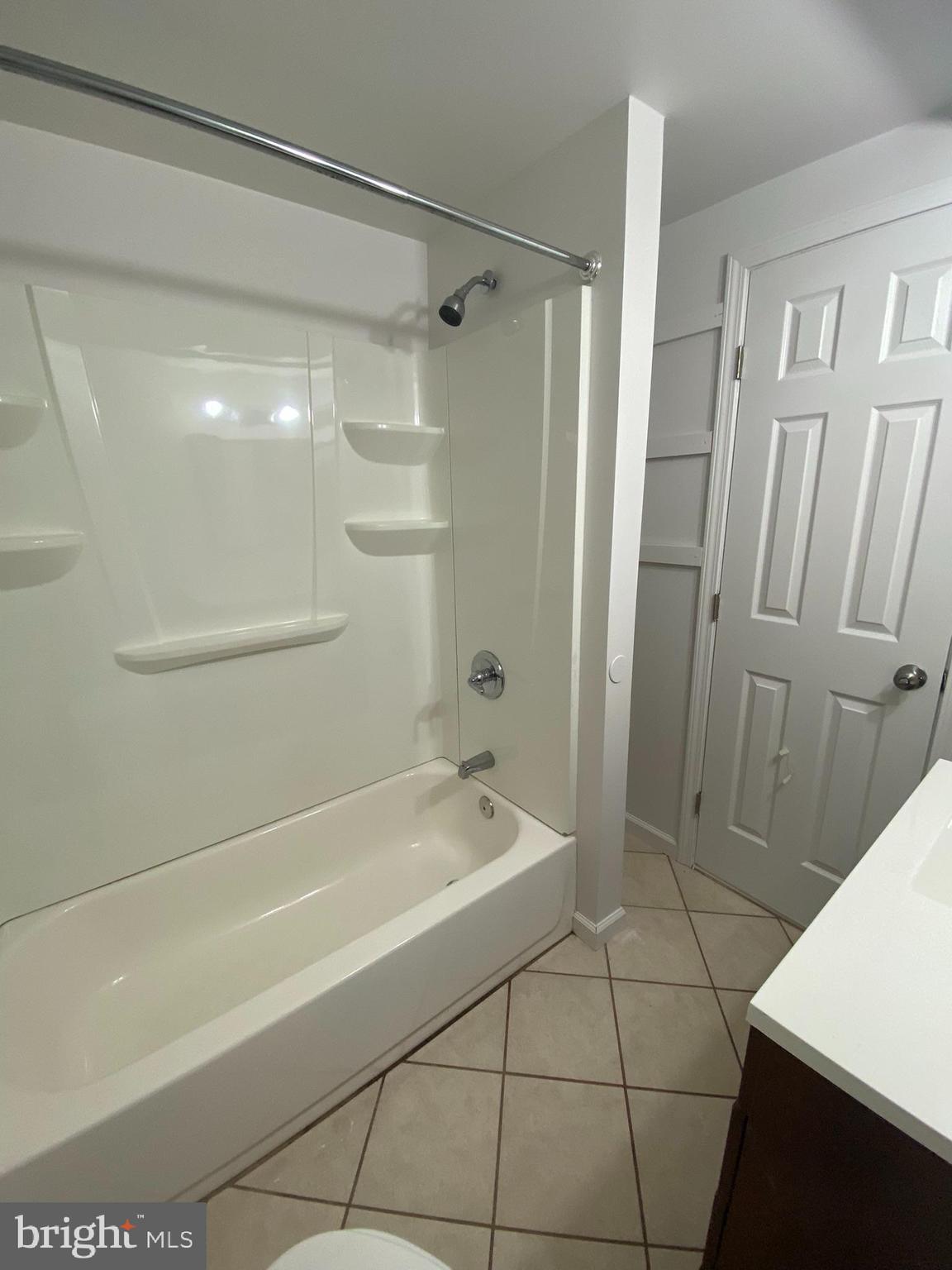 22 Fairmount Drive Glassboro, NJ 08028 - Photo 32 of 41 a bathroom with a bathtub and a shower