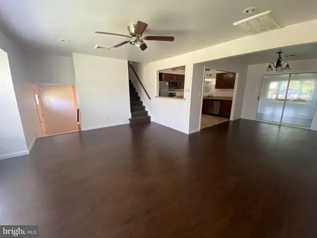 a view of a livingroom with wooden floor
