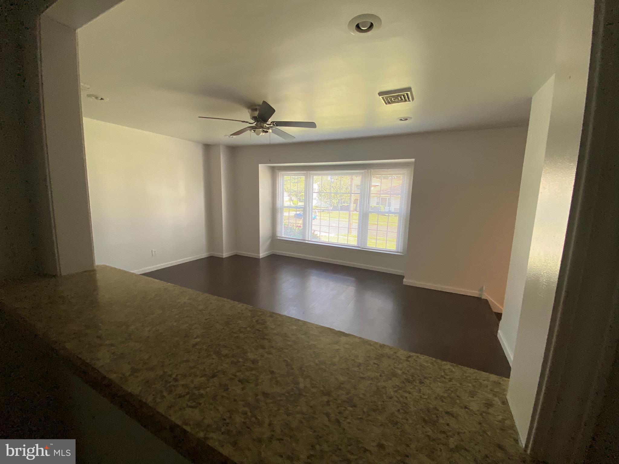 22 Fairmount Drive Glassboro, NJ 08028 - Photo 10 of 41 wooden floor in an empty room with a window