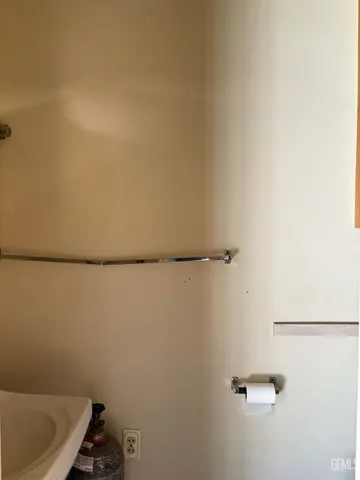 a view of house with wooden fence