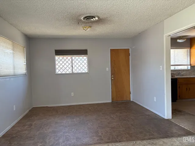 an empty room that has a window
