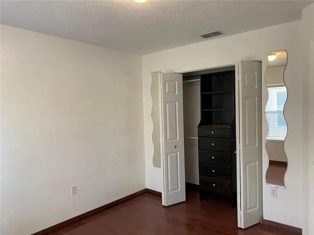 wooden floor and window in a room