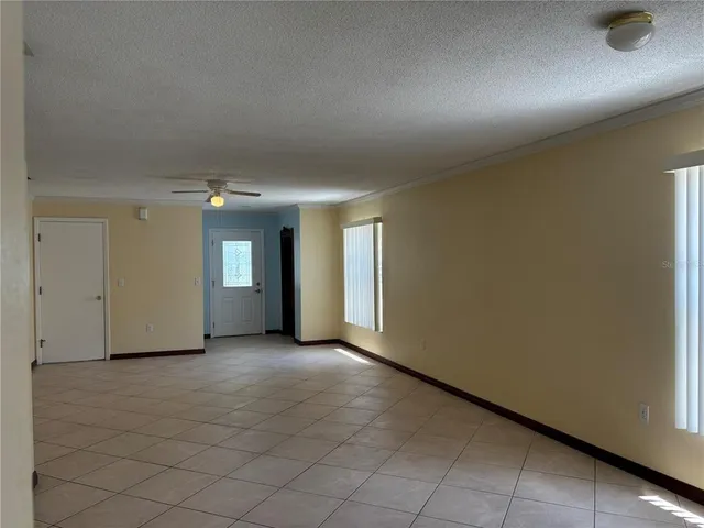 an empty room with windows