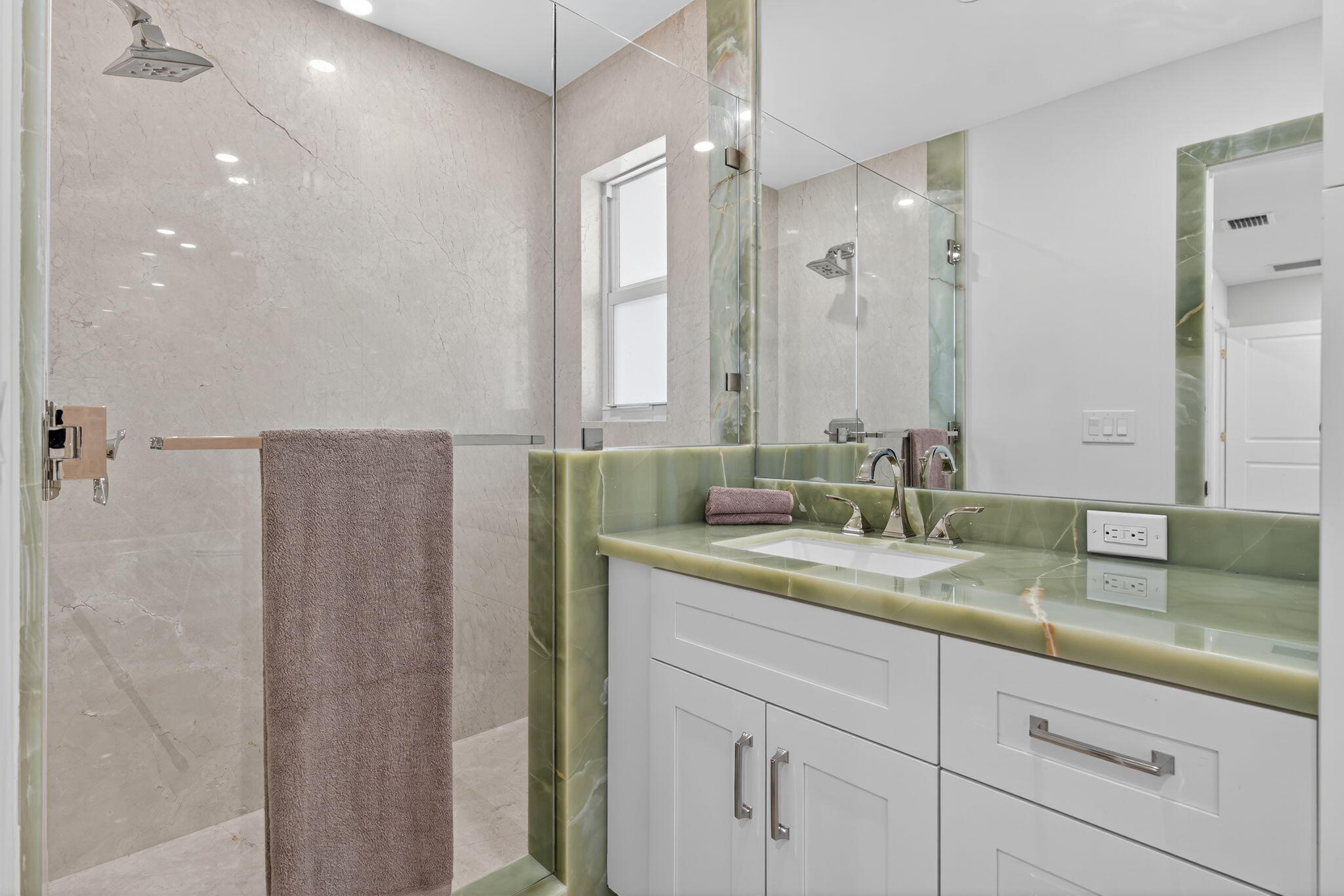 5273 Southeast Tall Pines Way Stuart, FL 34997 - Photo 34 of 62 a bathroom with a granite countertop sink mirror and double