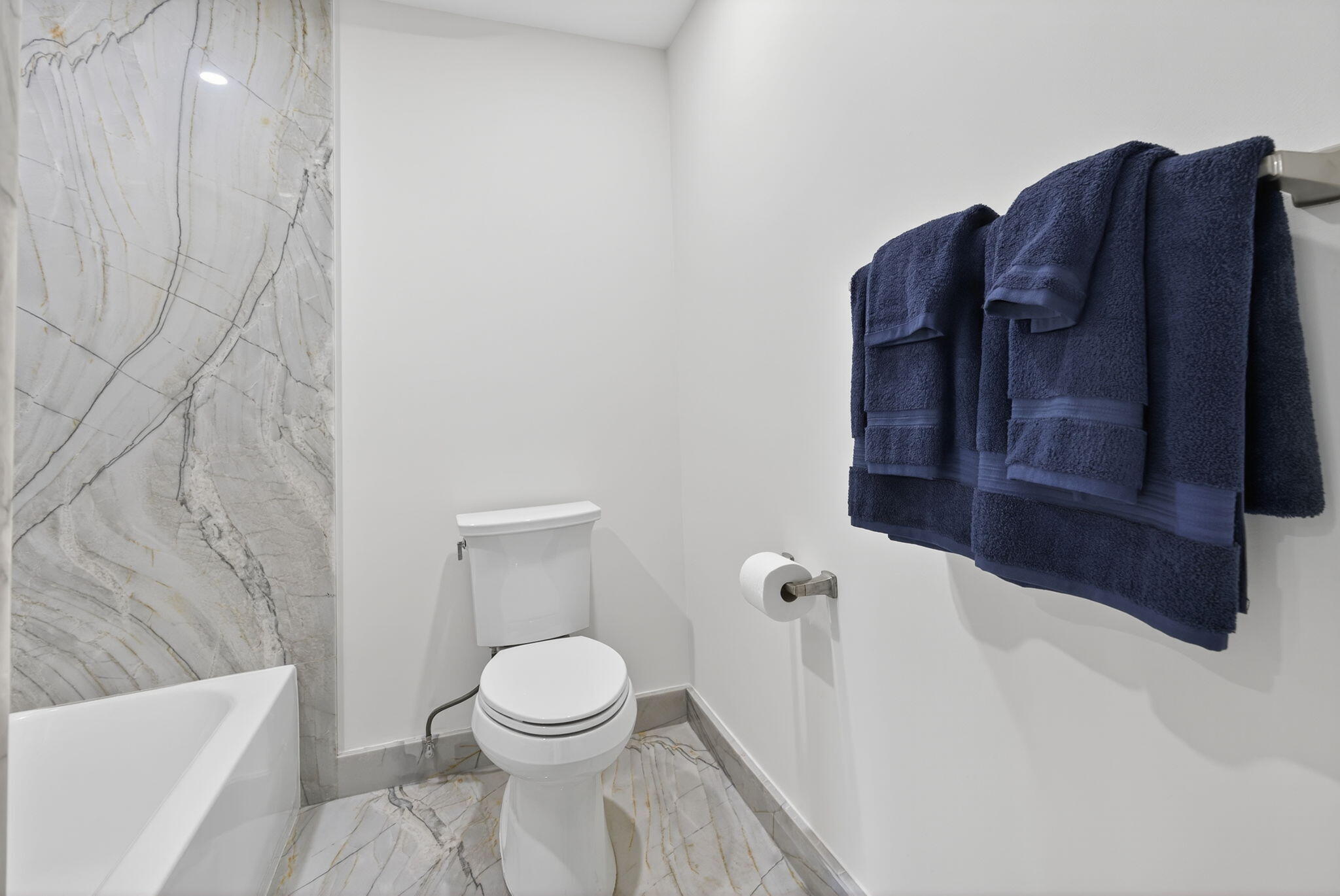 5273 Southeast Tall Pines Way Stuart, FL 34997 - Photo 44 of 62 a bathroom with a toilet and shower