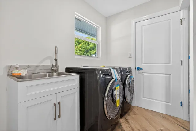 an aerial view of a house with a yard and a garden
