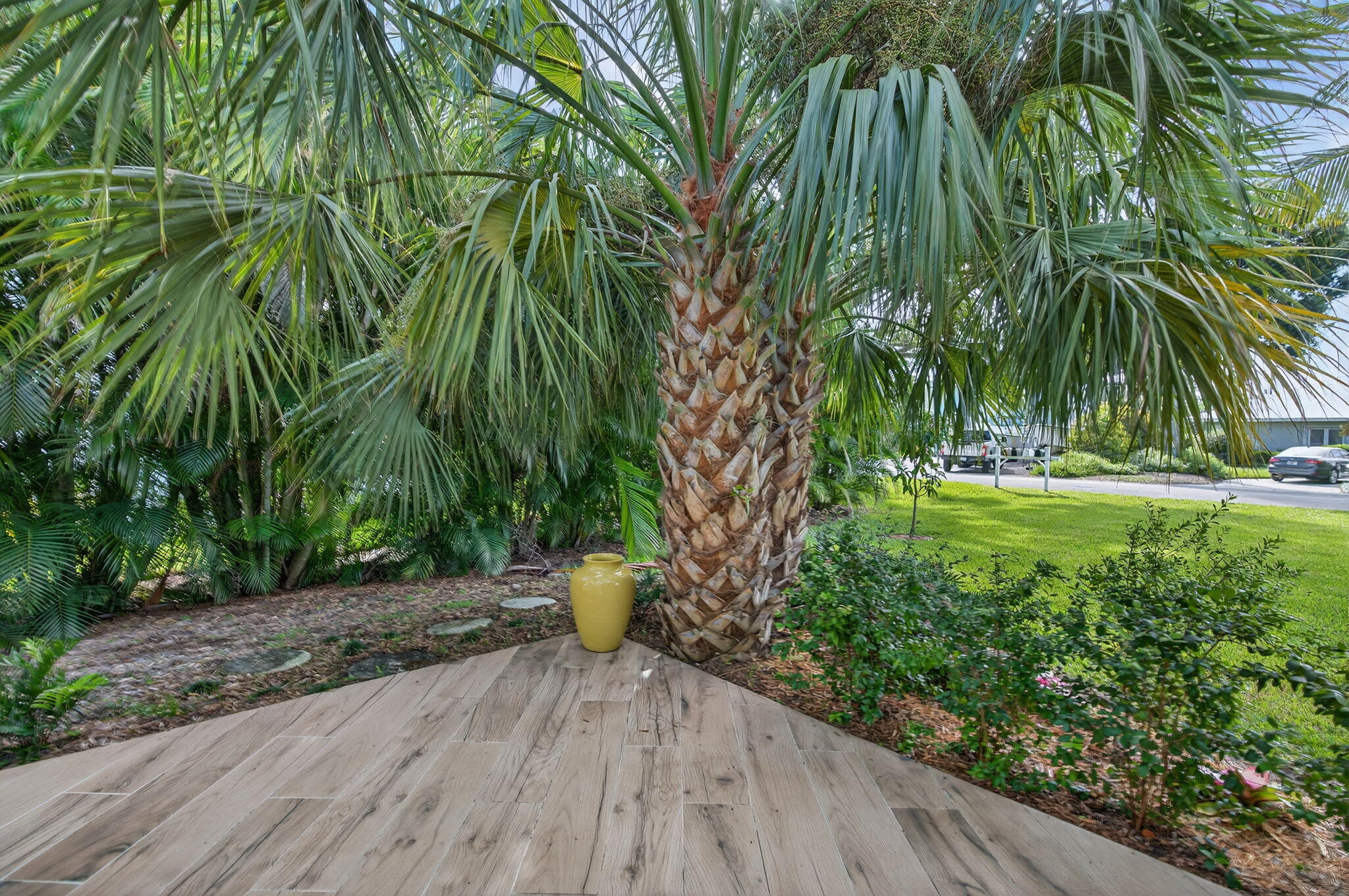 5273 Southeast Tall Pines Way Stuart, FL 34997 - Photo 53 of 62 a backyard of a house with lots of green space