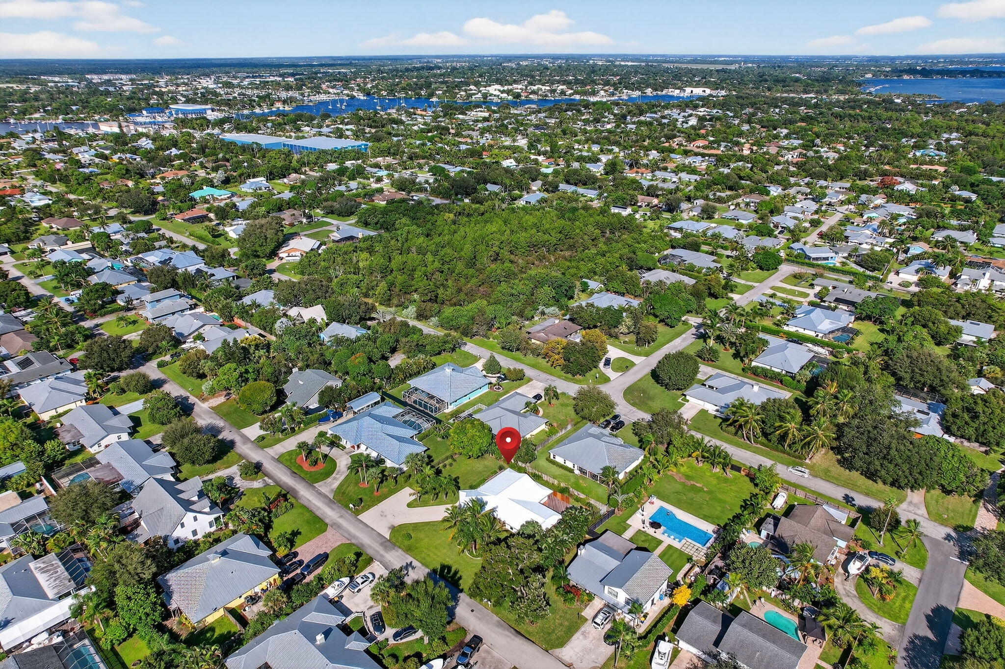 5273 Southeast Tall Pines Way Stuart, FL 34997 - Photo 61 of 62 an aerial view of multiple house