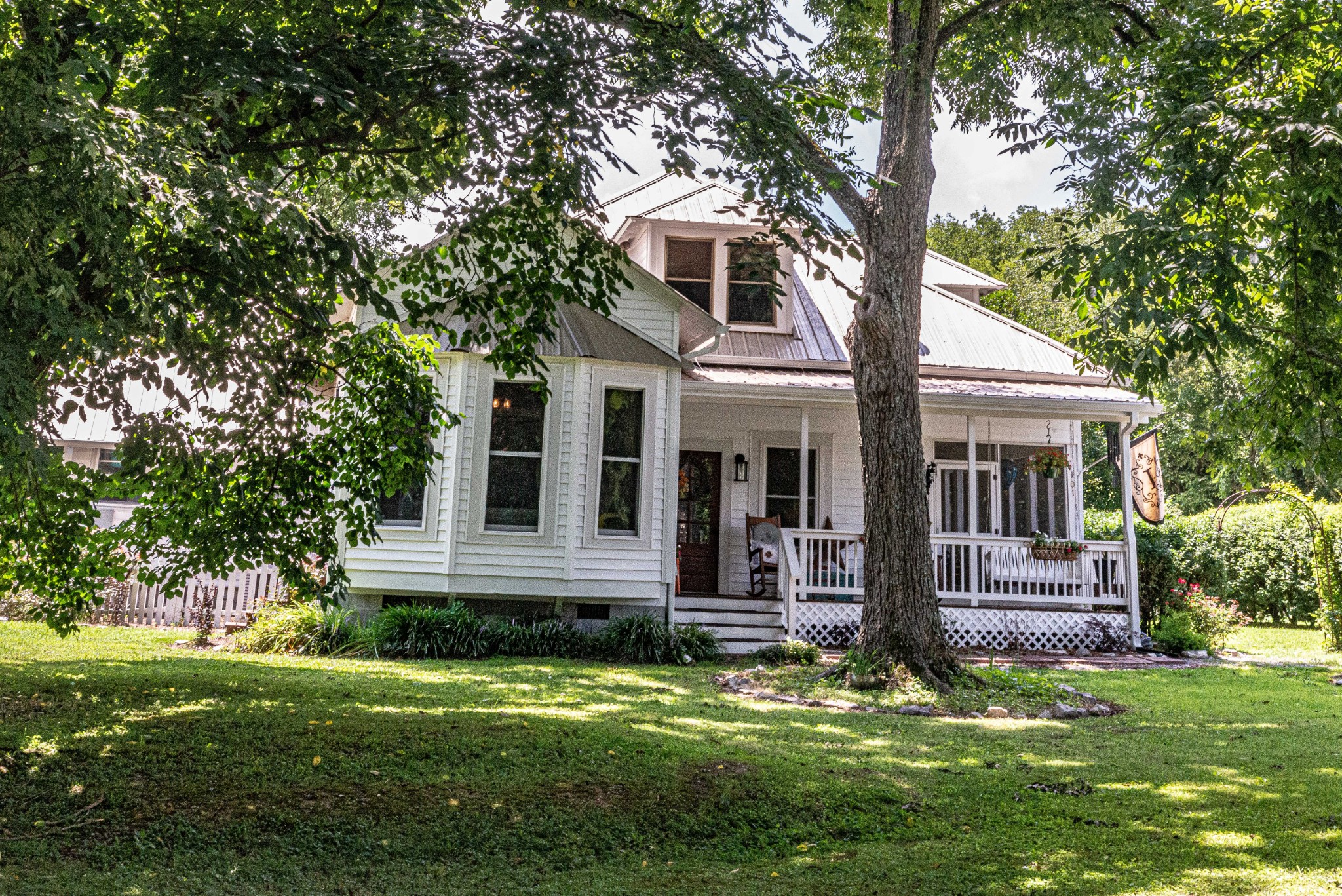 101 Rowesville Road Normandy, TN 37360 - Photo 1 of 47 a front view of a house with a yard and porch