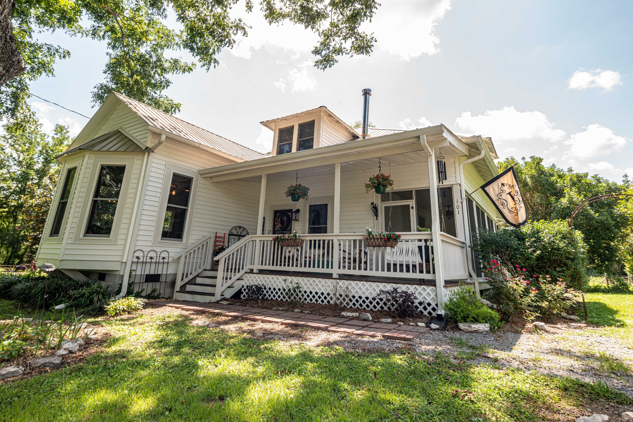 101 Rowesville Road Normandy, TN 37360 - Photo 2 of 47 a front view of a house with a yard