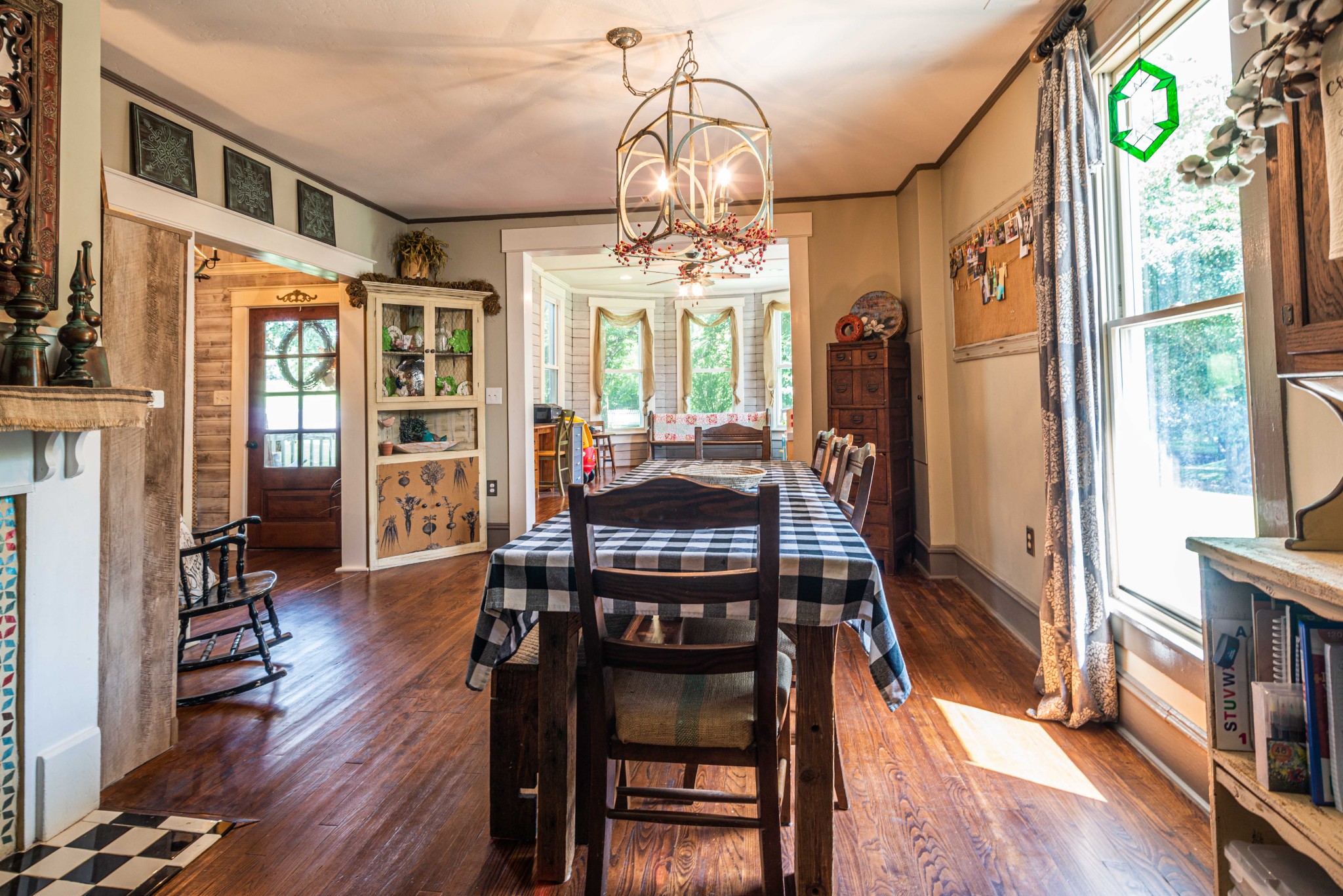 101 Rowesville Road Normandy, TN 37360 - Photo 11 of 47 a view of a dining room with furniture window and wooden floor