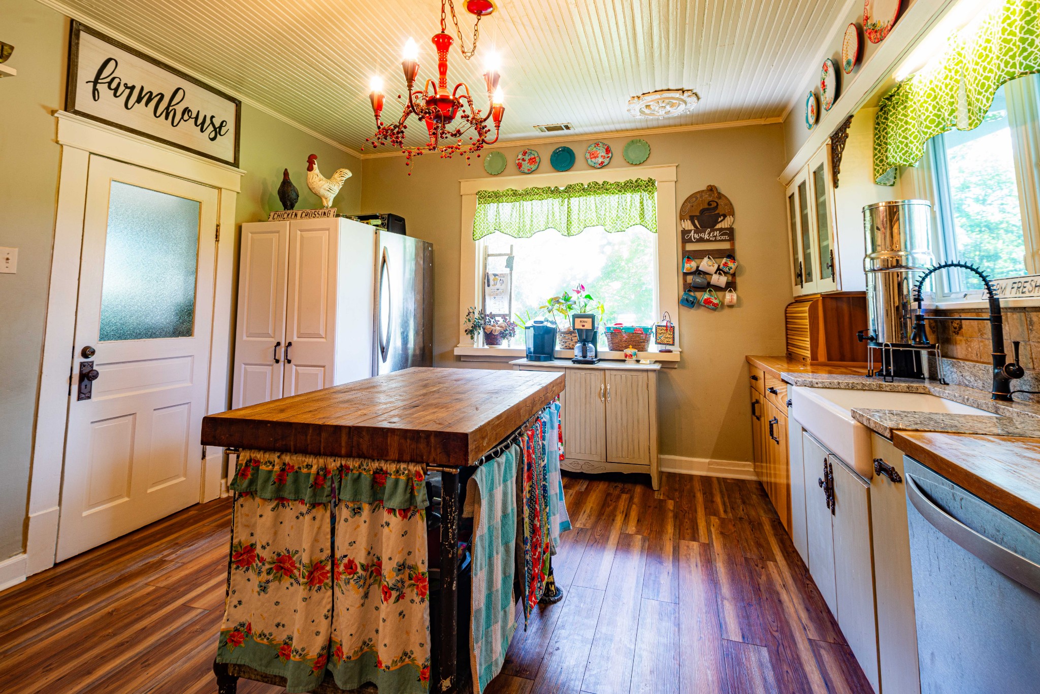 101 Rowesville Road Normandy, TN 37360 - Photo 14 of 47 a kitchen that has a table chairs in it and wooden floors