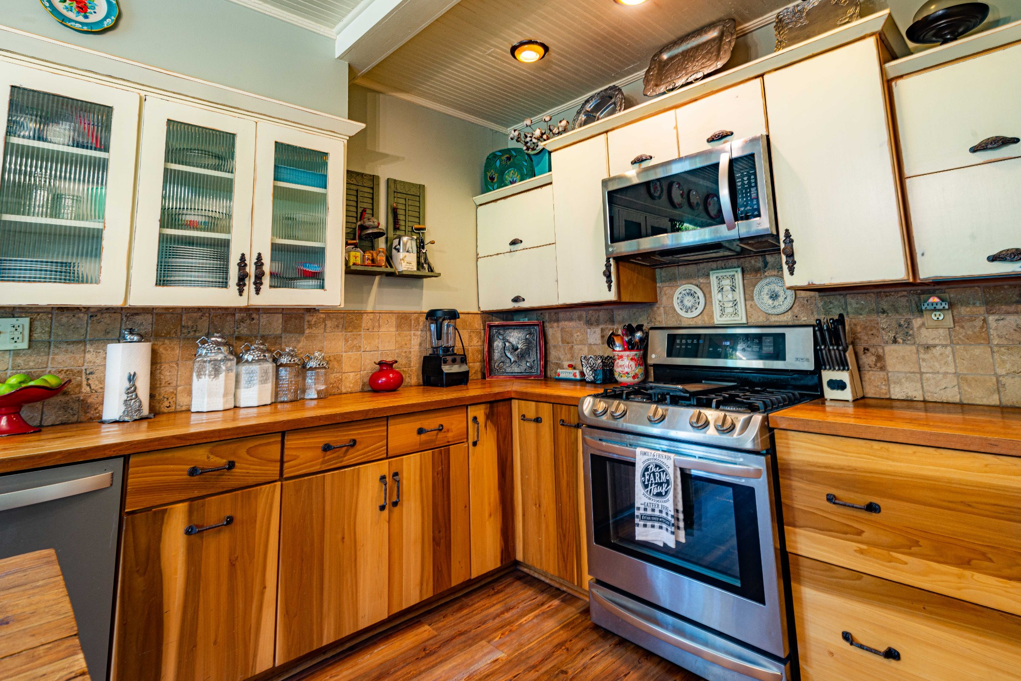101 Rowesville Road Normandy, TN 37360 - Photo 16 of 47 a kitchen with stainless steel appliances granite countertop a stove and a sink