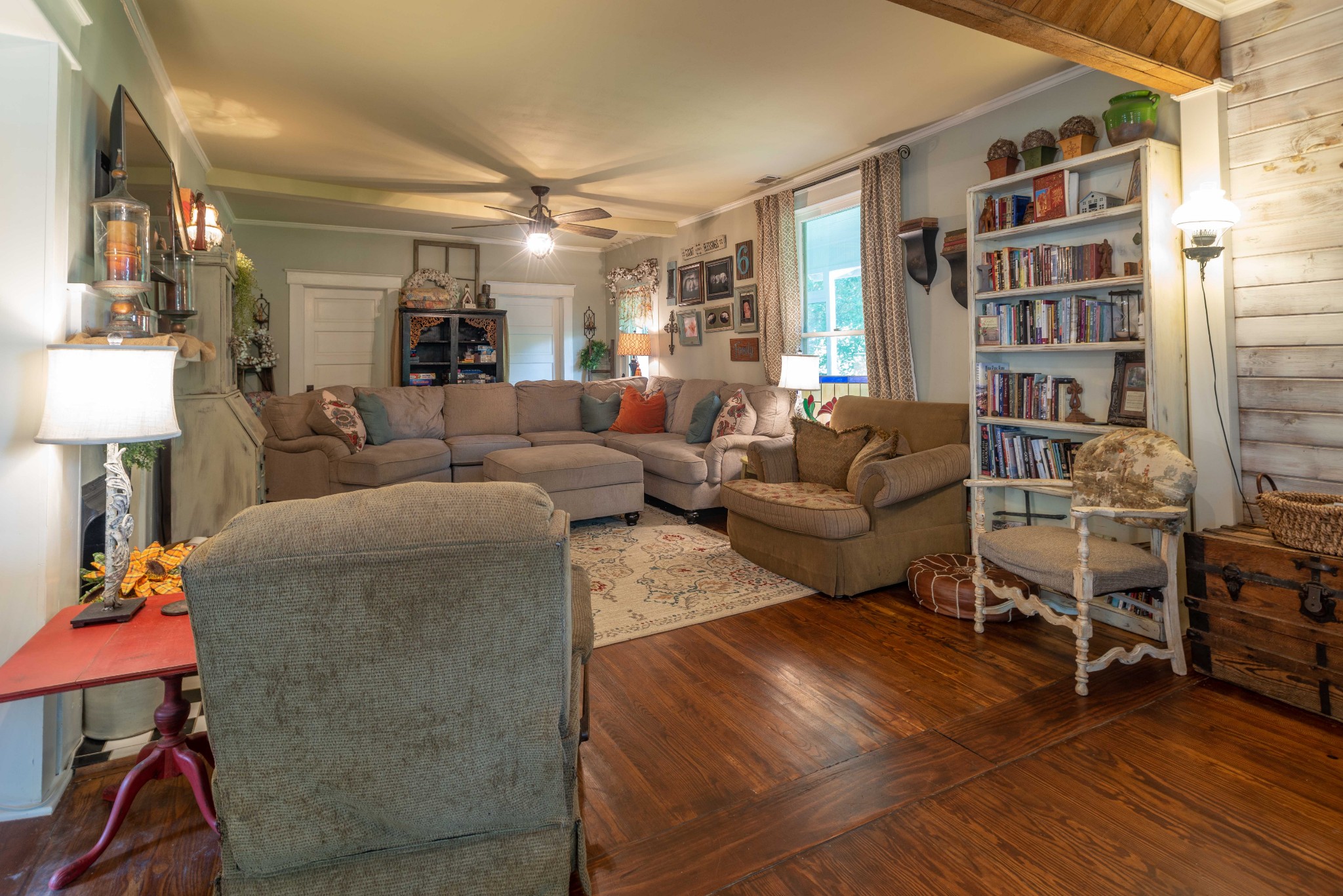 101 Rowesville Road Normandy, TN 37360 - Photo 21 of 47 a living room with furniture and a book shelf