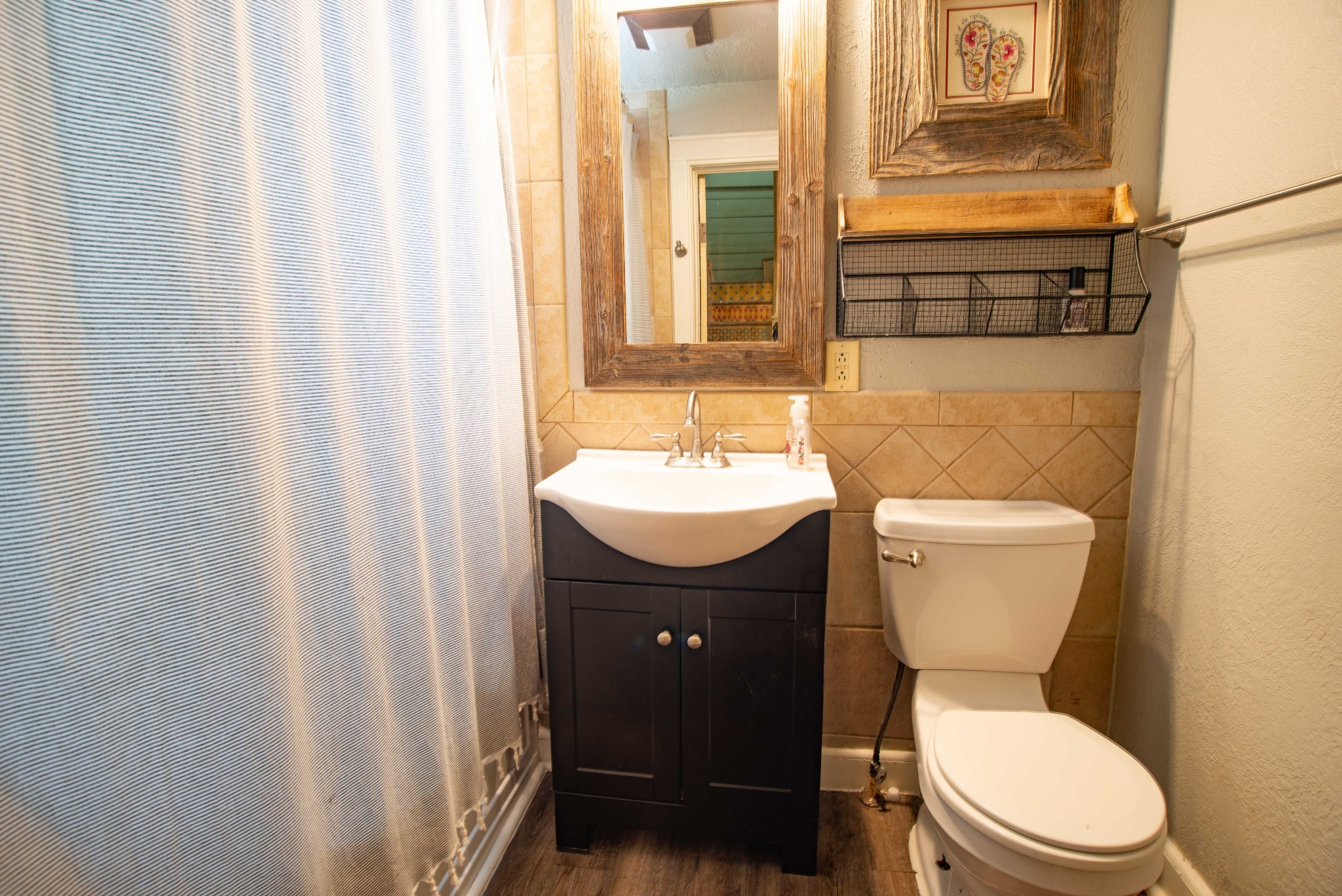 101 Rowesville Road Normandy, TN 37360 - Photo 22 of 47 a white toilet sitting next to a bathroom sink