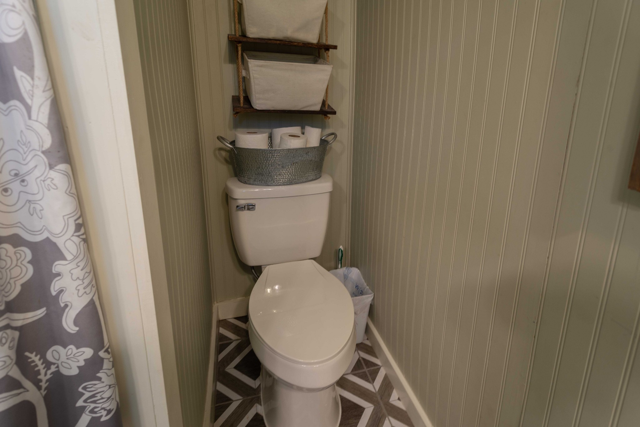 101 Rowesville Road Normandy, TN 37360 - Photo 25 of 47 a white toilet sitting next to a shower curtain