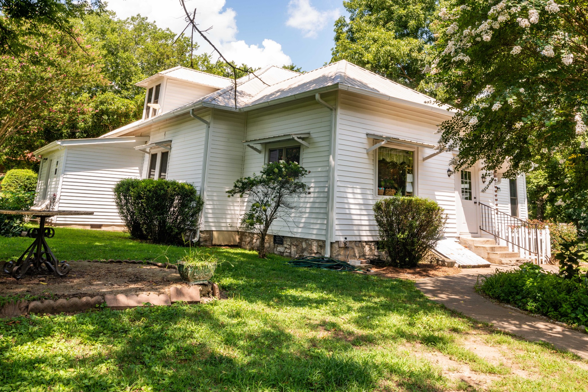 101 Rowesville Road Normandy, TN 37360 - Photo 3 of 47 a view of a house with a yard and plants