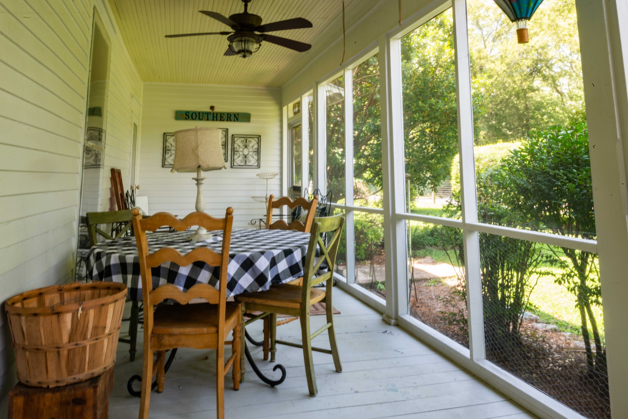101 Rowesville Road Normandy, TN 37360 - Photo 8 of 47 a dining room with furniture a rug and a floor to ceiling window