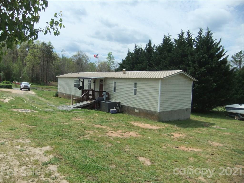 553 Parris Road Rutherfordton, NC 28139 - Photo 1 of 23 a view of a house with a backyard