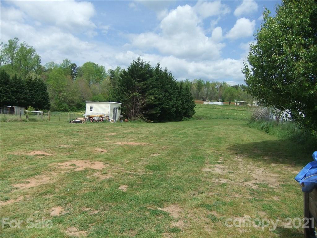 553 Parris Road Rutherfordton, NC 28139 - Photo 19 of 23 a backyard of a house with lots of green space