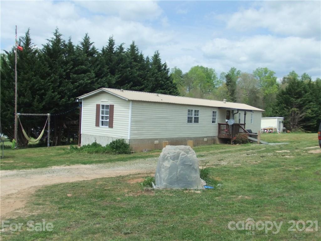 553 Parris Road Rutherfordton, NC 28139 - Photo 3 of 23 a house view with a garden space