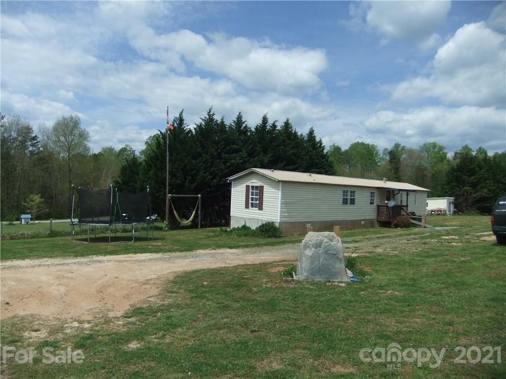553 Parris Road Rutherfordton, NC 28139 - Photo 21 of 23 a house view with a garden space