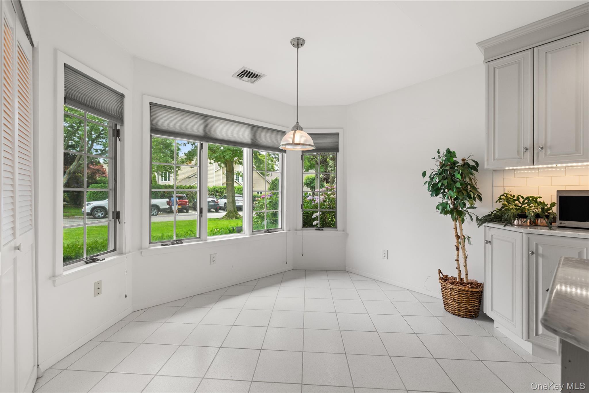 34 Cedar Ridge Lane Bay Shore, NY 11706 - Photo 6 of 27 a view of an empty room with a window