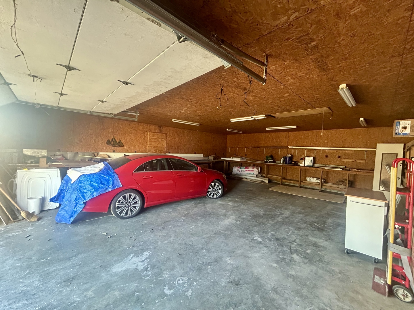 207 Butler Street Metropolis, IL 62960 - Photo 13 of 28 a view of a garage with a car