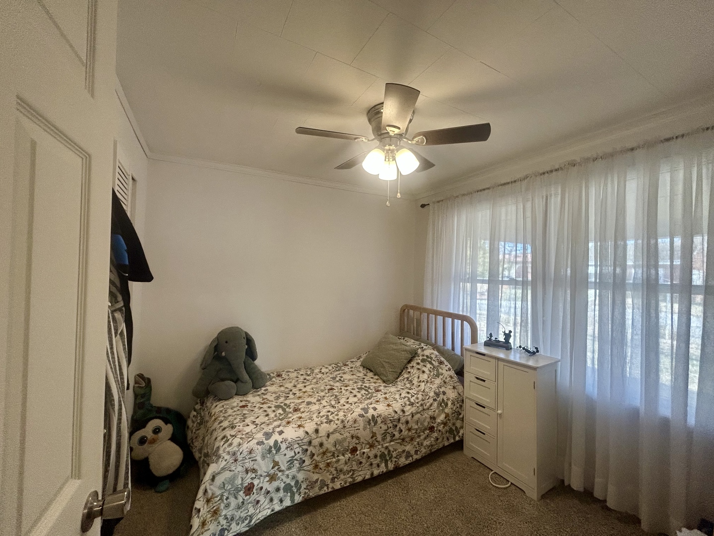 207 Butler Street Metropolis, IL 62960 - Photo 18 of 28 a bedroom with bed and a window