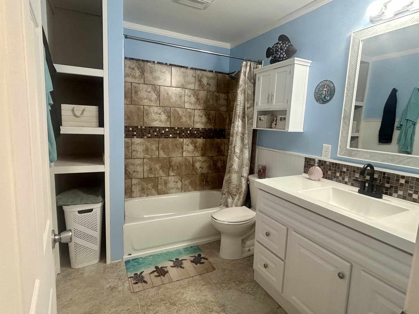 207 Butler Street Metropolis, IL 62960 - Photo 26 of 28 a bathroom with a sink toilet and shower